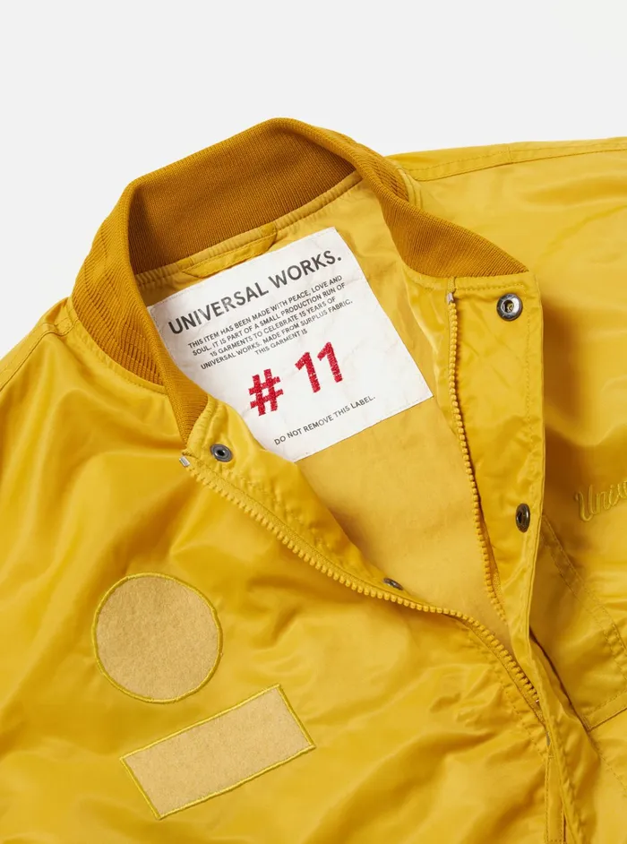 Jackets Men Universal Works Universal Works Badge Bomber In Yellow Flight Nylon